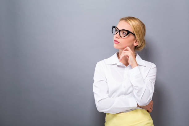 istock Young woman in a thoughtful pose 907844854