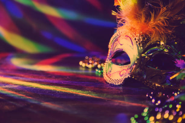 istock Mardi Gras, Rio carnival mask and colorful decorations. 907845296