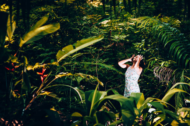 istock Young woman in the forest 907849838