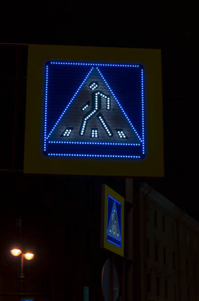 istock Luminous road signs pedestrian crossing 907850614
