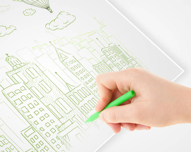 A person drawing sketch of a city with balloons and clouds on a paper A person drawing sketch of a city with balloons and clouds on a plain paper escribir stock pictures, royalty-free photos & images