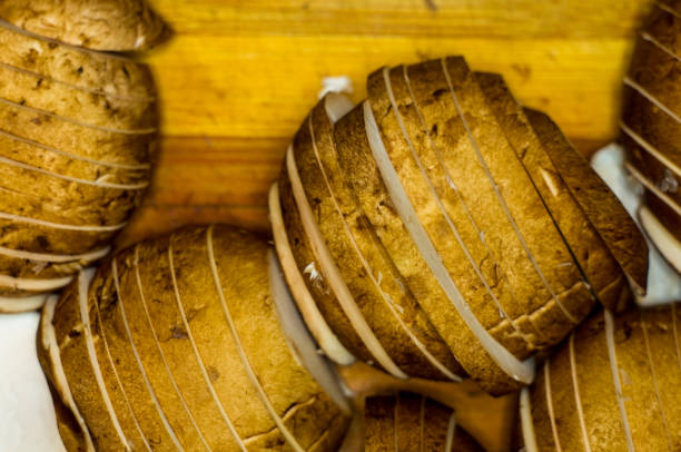 istock sliced before cooking fresh king mushrooms champignons on a bamboo Board 907853166