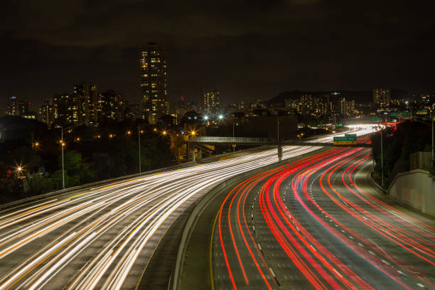 istock Light trails on the Kapiolani exit to the motorway 907853472