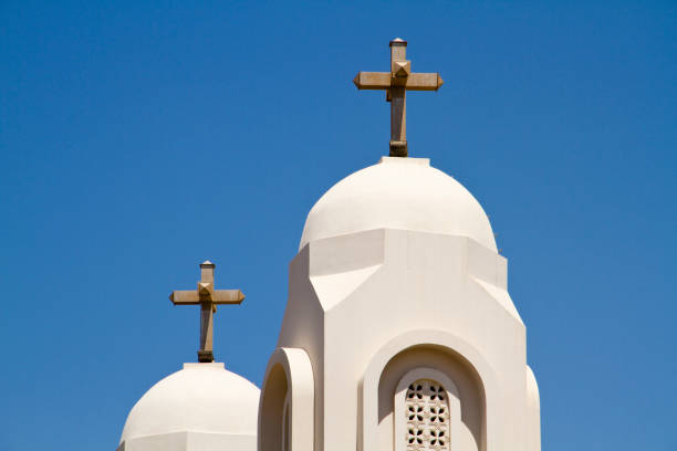 istock White Church with Blue Sky 907854000