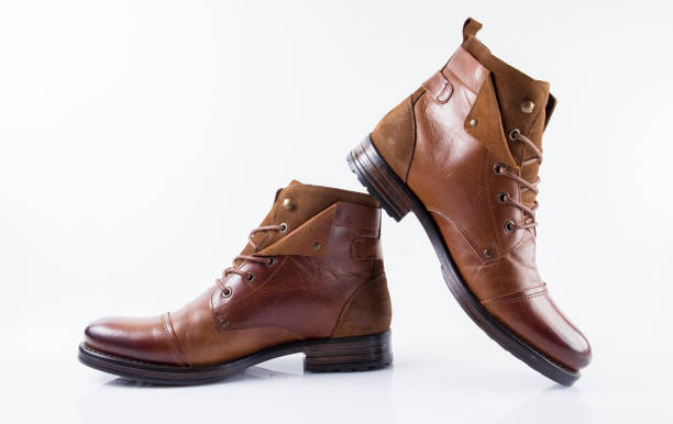 istock Male brown leather boot on white background, isolated product, comfortable footwear. 907855340