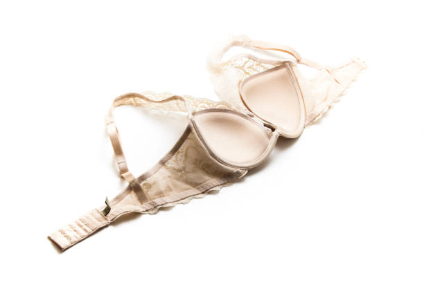 istock Beige bra isolated on white background 907857926