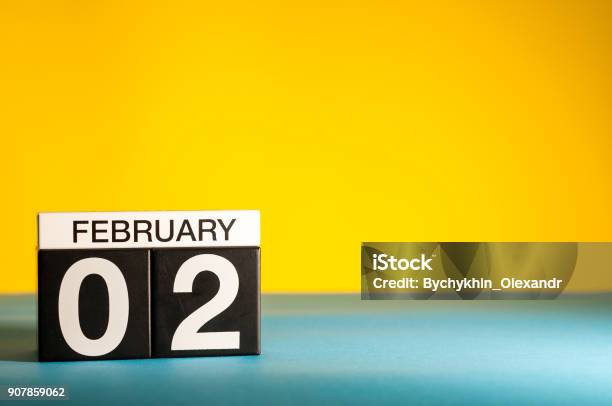 February 2nd Day 2 Of February Month Calendar On Yellow Background Winter Time Empty Space For Text Stock Photo - Download Image Now