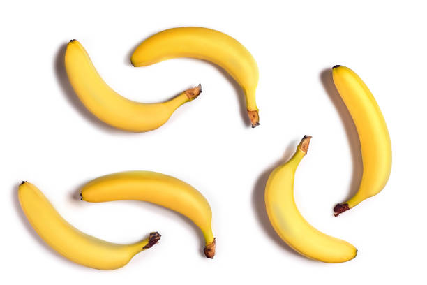 istock Ripe yellow bananas on a white background 907861146