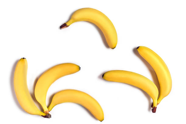 istock Ripe yellow bananas on a white background 907861222