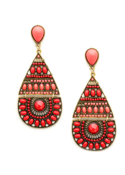 istock earrings in Boho style with coral beads isolated on white 907862166