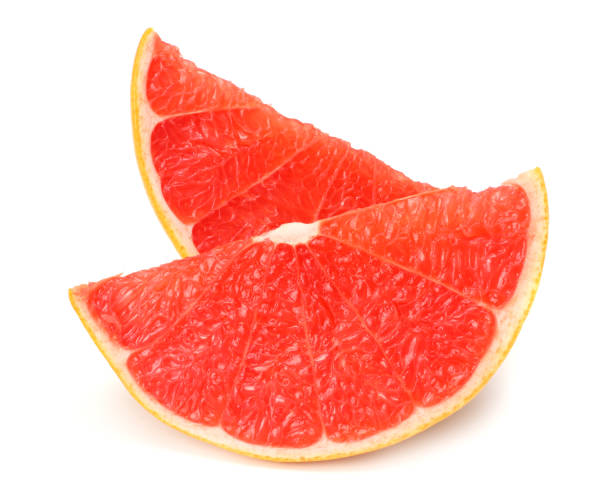istock healthy food. grapefruit isolated on white background 907862290