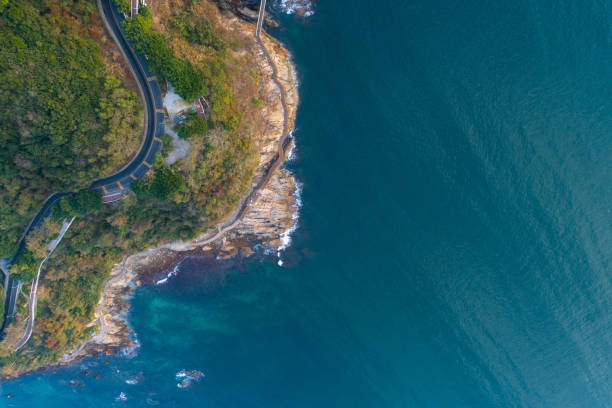 istock looking down from drone aerial view of the coastline 907865020