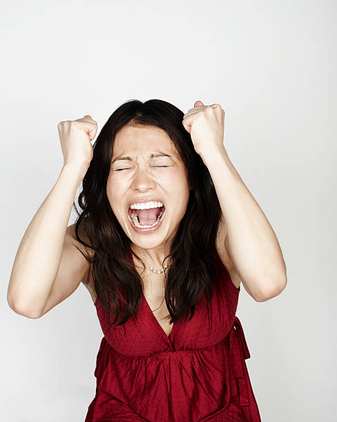 portrait of woman looking frustrated - portrait vertical close up female imagens e fotografias de stock