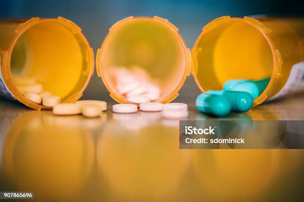 Mixing Medications Stock Photo - Download Image Now - Medicine, Pill, Capsule - Medicine