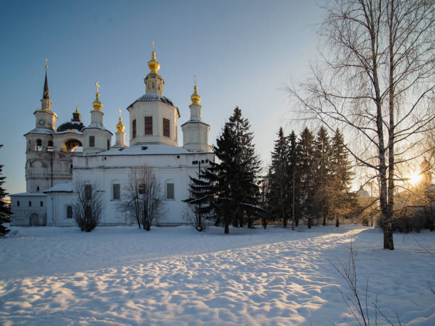 istock Old church at sunset 907869514