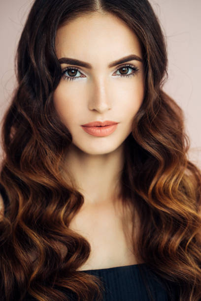 istock Studio shot of young beautiful woman 907872420