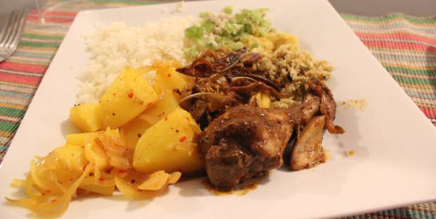 istock Typical Sri Lanka meal with Chicken, Rice, Potato and Vegetable 907873100
