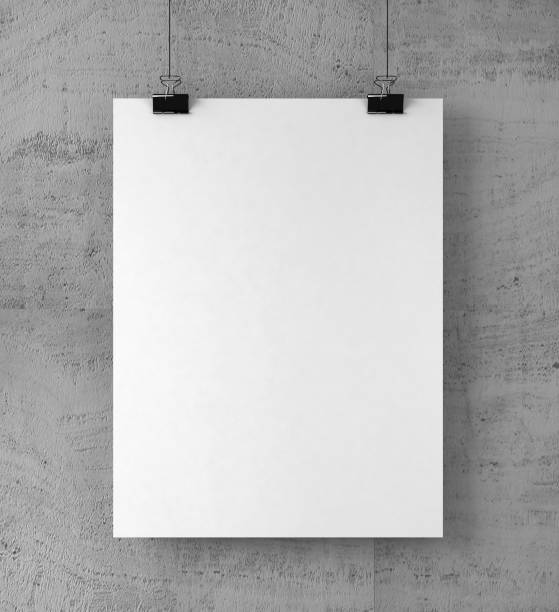 istock Poster on binder clips on Concrete wall. Paper mockup 907873170