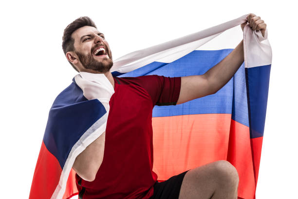 istock Russian male athlete / fan celebrating on white background 907875986