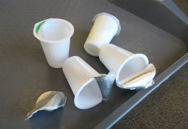 Lifestyle, Small Plastic Milk Cups. stock photo