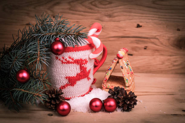istock beautiful Christmas Cup on a wooden table 907878758