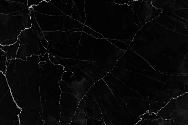 istock Black marble patterned texture background. abstract natural marble black and white for design. 907880722
