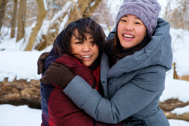 istock Pretty Young Women Smiling At The Camera 907882250