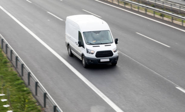 istock White Delivery Van On The Highway 907887898