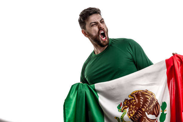 istock Mexican male athlete / fan celebrating on white background 907888610