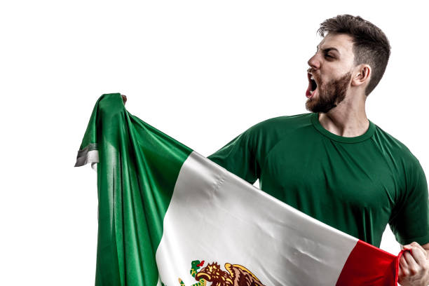 istock Mexican male athlete / fan celebrating on white background 907888618