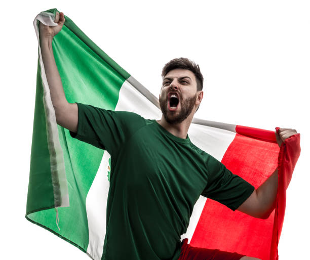 istock Mexican male athlete / fan celebrating on white background 907888624
