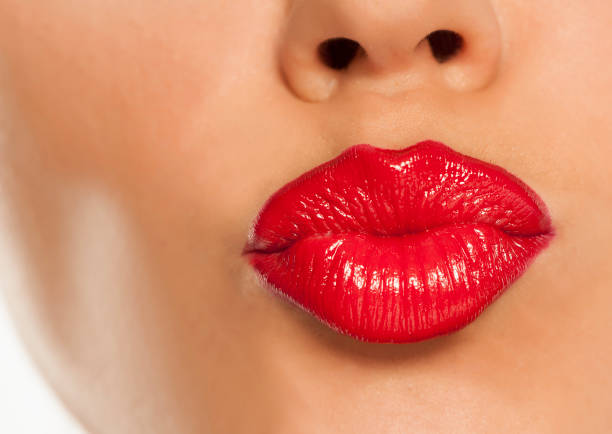 istock red lipstick and kiss 907889192