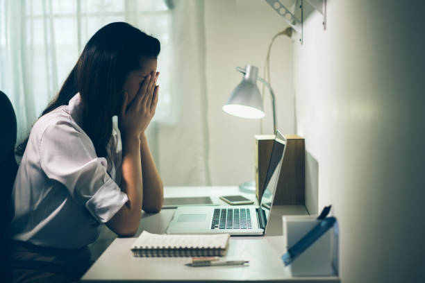 istock Woman stress from office she came to work at home. 907892054