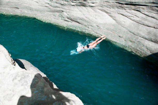 istock Jump into the sea 907892332