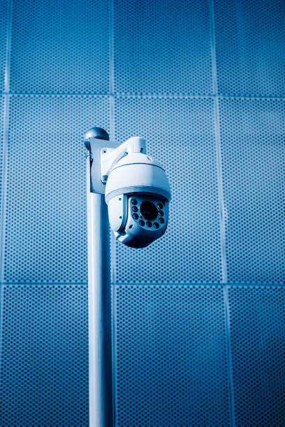 istock Security camera in front of the office building 907893120