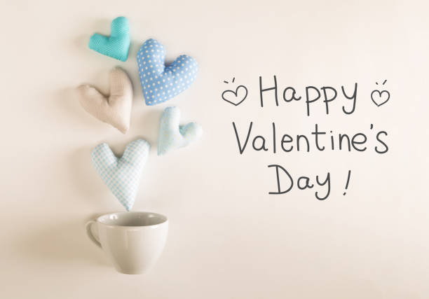 istock Valentine's Day message with blue heart cushions 907900418