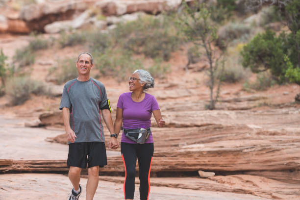 istock Senior Couple Hiking in Desert 907903990