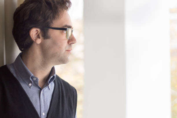 istock Portrait of a man thinking. 907908266