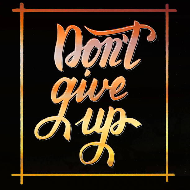istock Don't give up - inspirational quote brush lettering 907910466