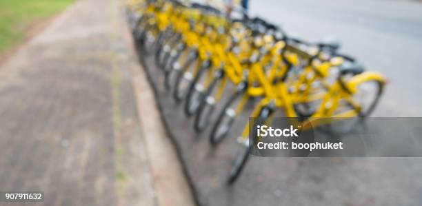 Blur Of The Yellow Bike In Bike Sharing Project Under The Governments Policies In Developing The Smart City Of Phuket Stock Photo - Download Image Now