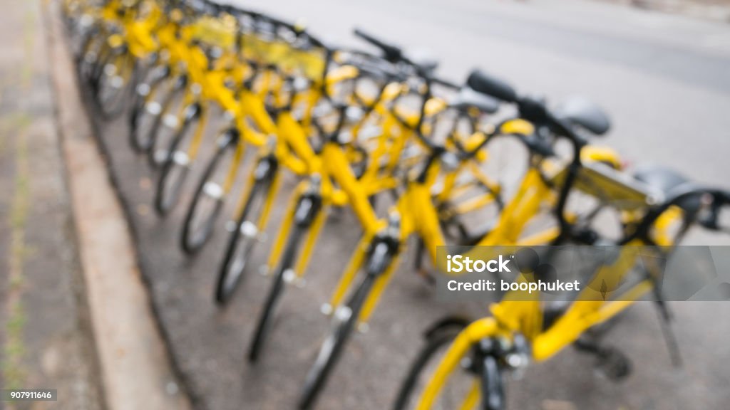 Blur of  The yellow bike in bike sharing project Under the Government's policies in developing the Smart city of Phuket 2017 Stock Photo