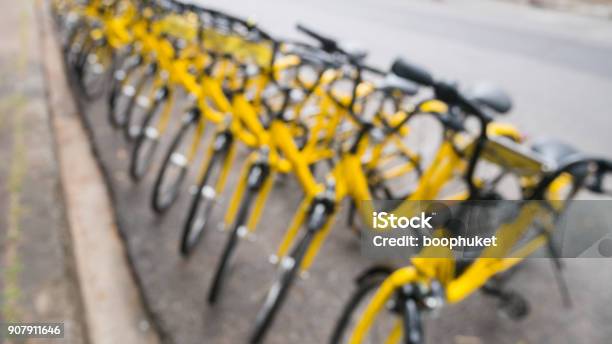 Blur Of The Yellow Bike In Bike Sharing Project Under The Governments Policies In Developing The Smart City Of Phuket Stock Photo - Download Image Now