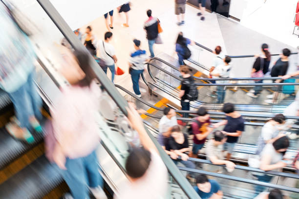 istock Motion escalators at the modern shopping mall 907912680