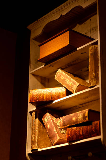 istock Old books on bookshelves. 907912794