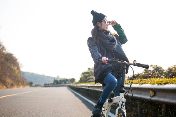 istock young woman riding at a sunny winter day 907912936