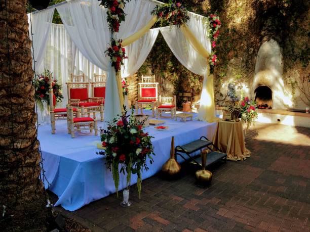 Colorful themed wedding stage and chairs.Hindu Traditional Wedding. stock photo
