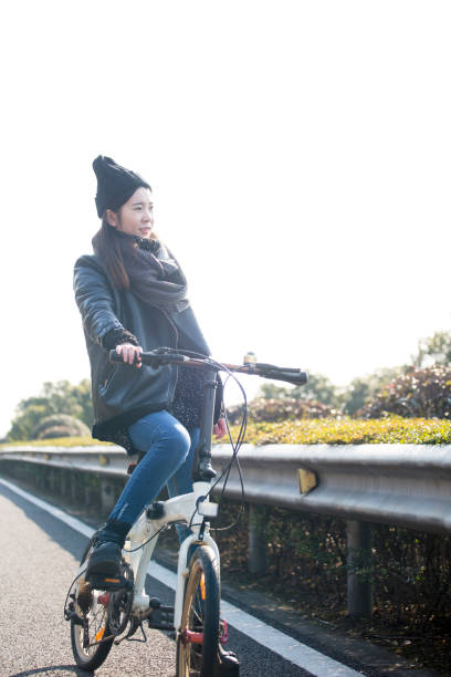 istock young woman riding at a sunny winter day 907912984