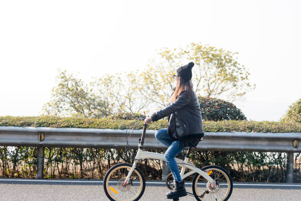 istock young woman riding at a sunny winter day 907913190