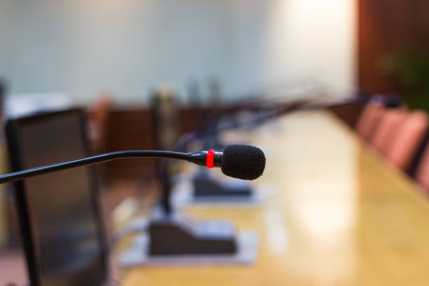 istock closeup Microphone in the meeting room 907915350