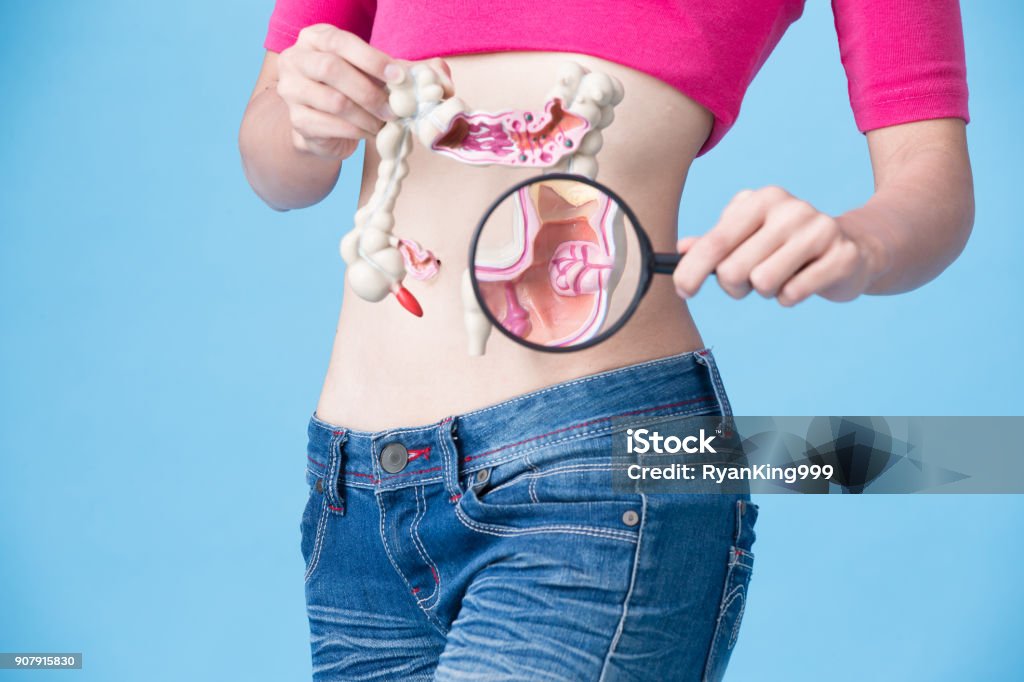 woman with colorectal cancer woman with colorectal cancer concept on the blue backgorund Colorectal Cancer Stock Photo